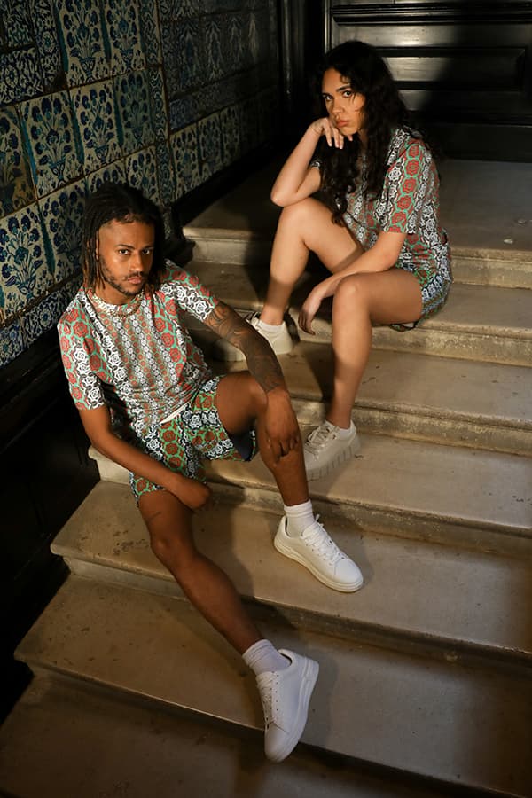 Two models wearing an Askari two piece. 